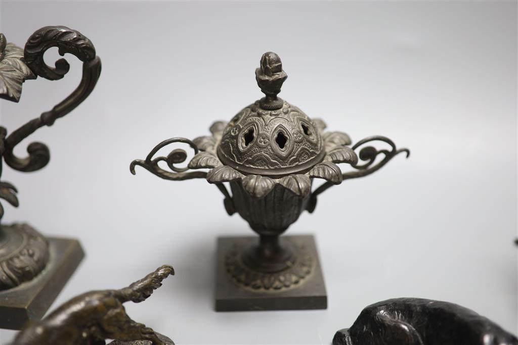 A collection of bronze and metal animals, sun dial and lidded urns etc
